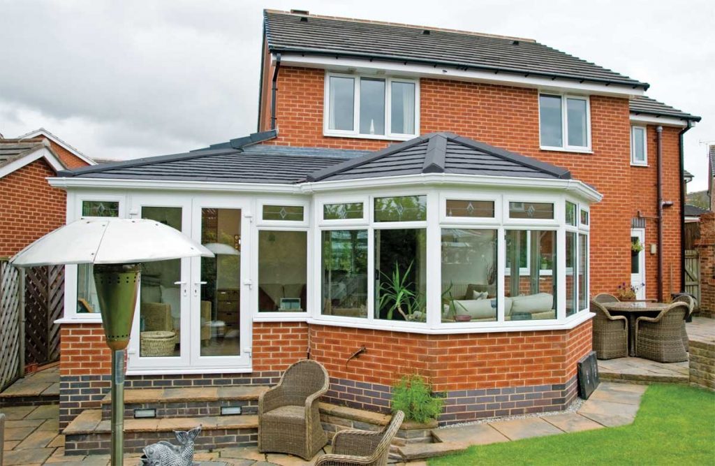 Tile conservatory roof added to existing conservatory for a warmer solution