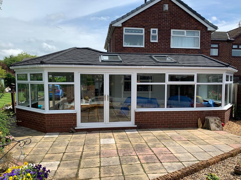 Black conservatory tiled roof replacement