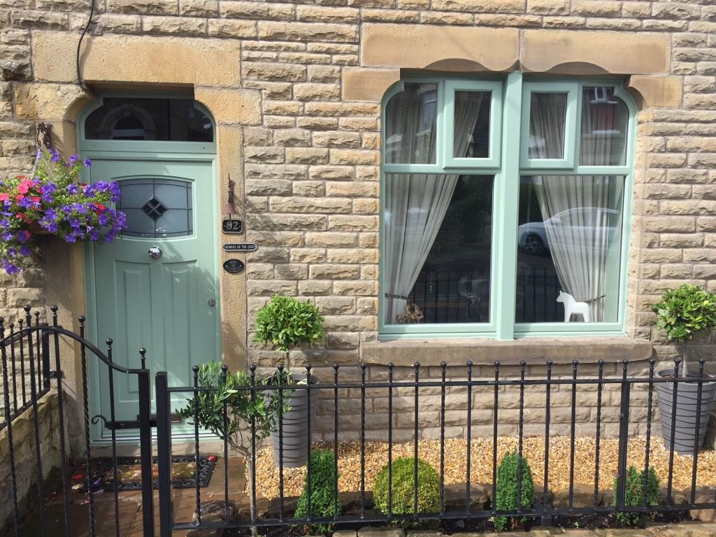 Chartwell green front door with bespoke windows