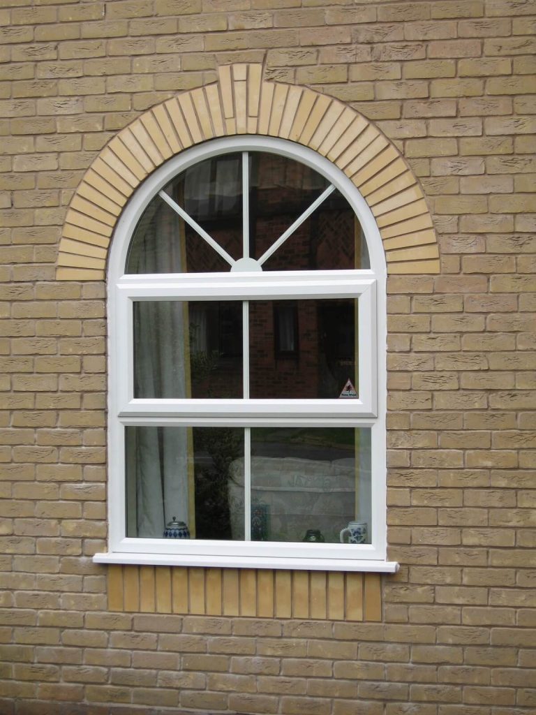 Arched uPVC window in white