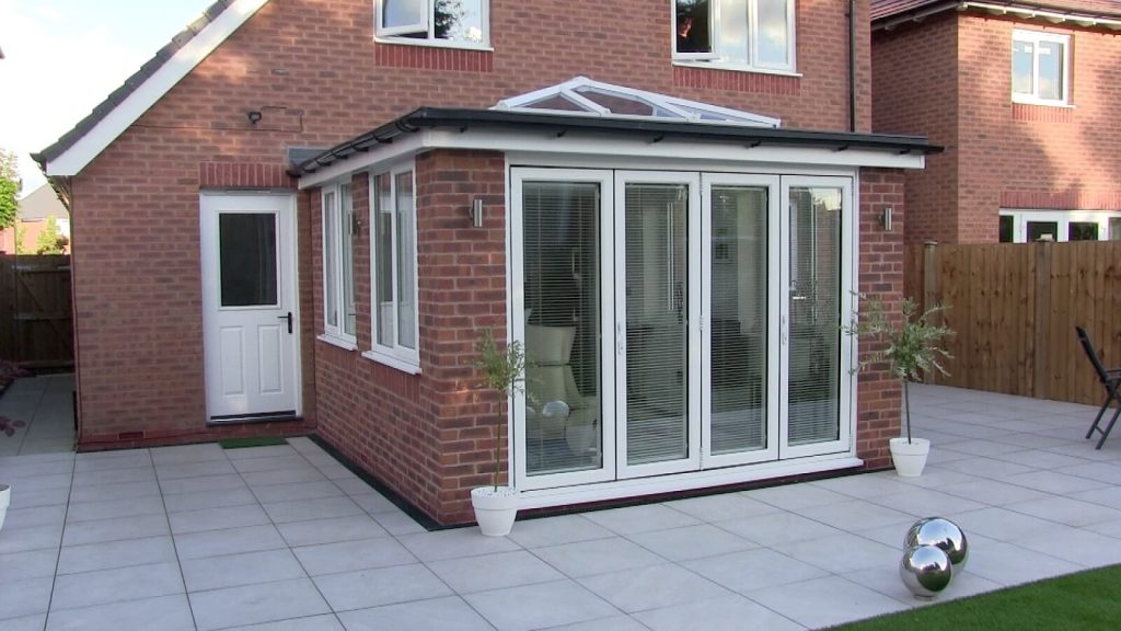 Lantern roof orangery with bifold doors