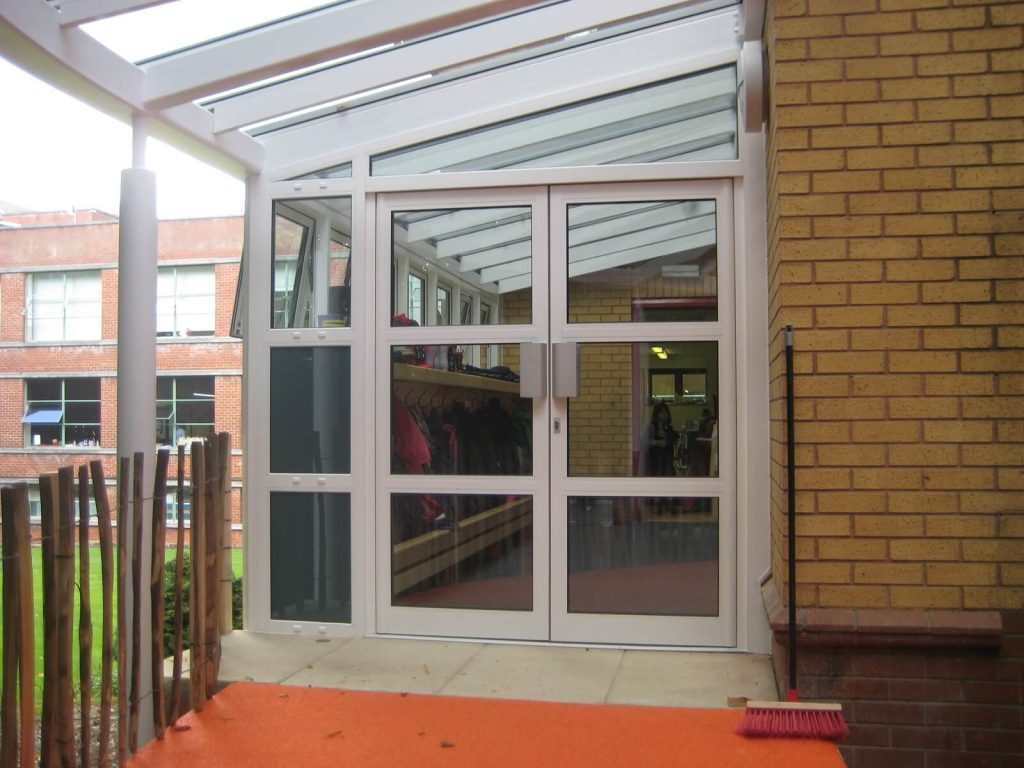 White aluminium double doors for cloakroom area