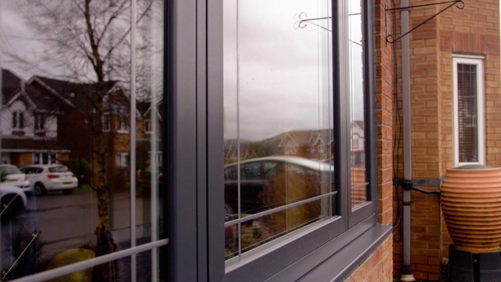 Close up of an anthracite grey flush sash window